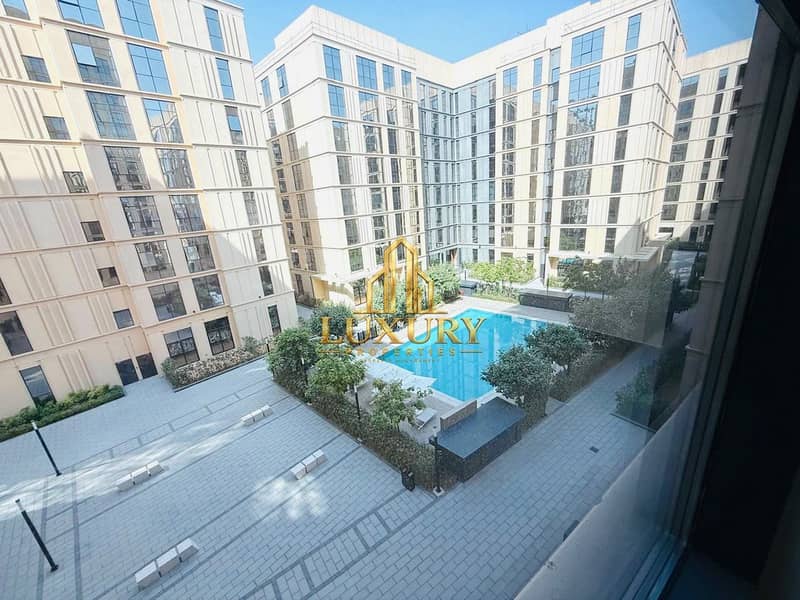 13 🏡 LUXURY POOL VIEW STUDIO FOR RENT | MAMSHA, SHARJAH 🌊 ✨ 450 Sq. Ft. | 💰 AED 29,990/Ye