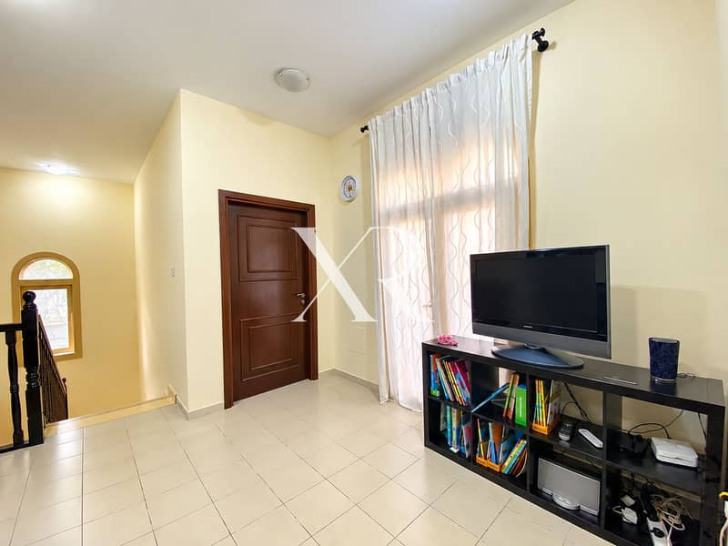 5 Bright Beige Hallway with TV Bookcase. png