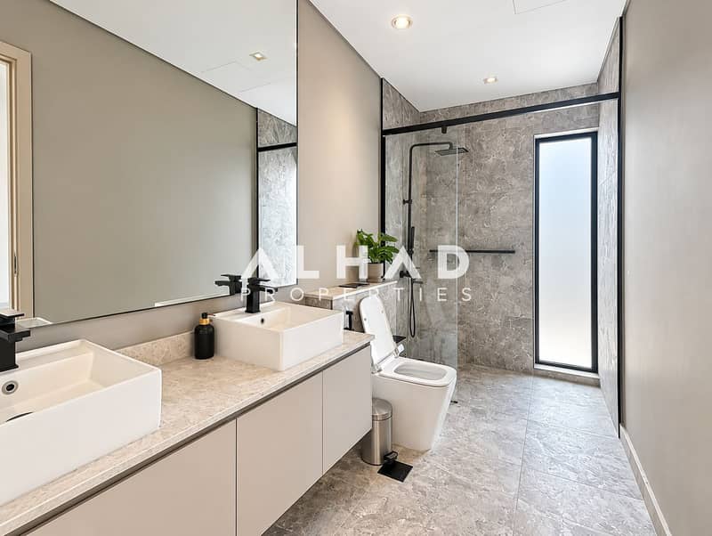 7 Modern Minimalist Gray-Tiled Bathroom. png