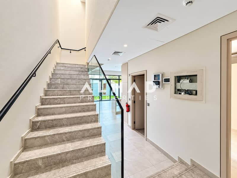 8 Modern Marble Stairway and Garden Hallway. png