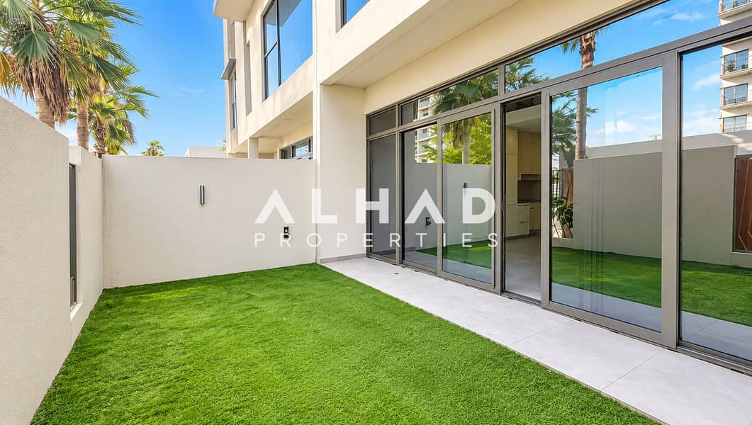 10 Sunlit Modern Courtyard with Palm Reflections. png