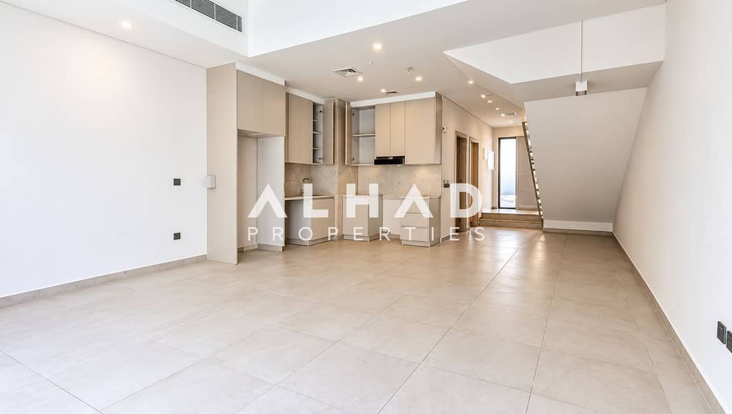 2 Bright Minimalist Open-Plan Kitchen Interior. png
