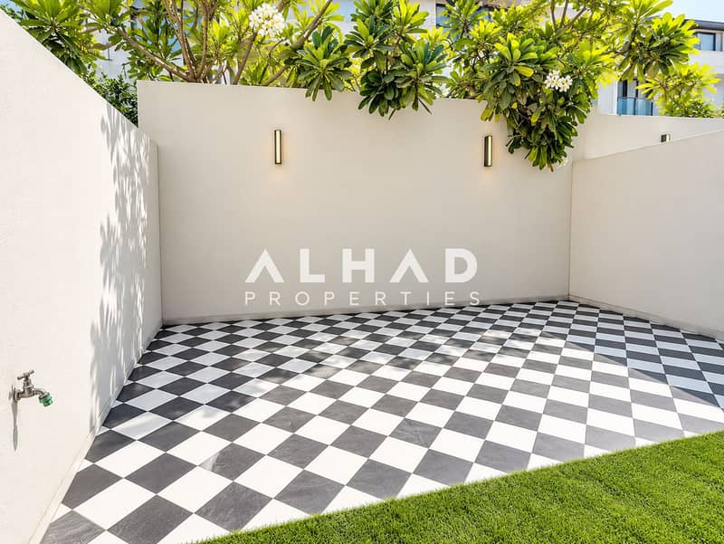 11 Sunlit Checkerboard Courtyard Oasis. png
