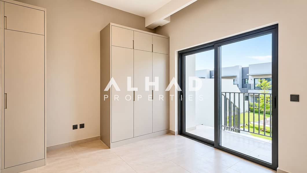8 Bright Minimalist Bedroom with Balcony View. png