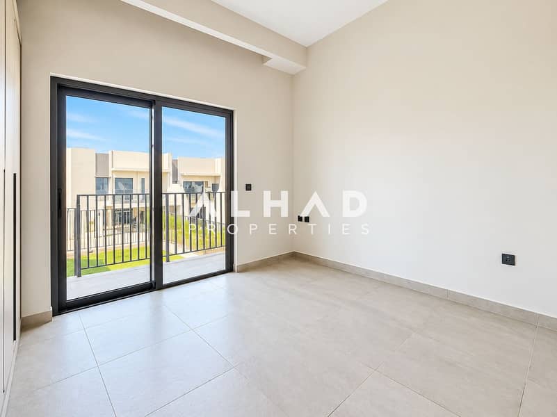 15 Bright Minimalist Room with Balcony View. png
