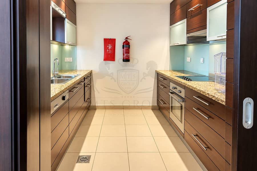 2 Modern Galley Kitchen with Fire Safety Gear. png