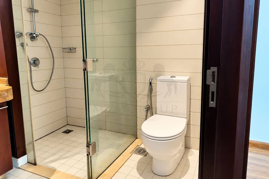 14 Modern Cream-Tiled Bathroom. png