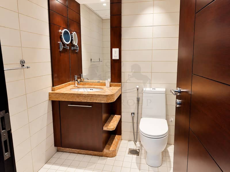 16 Modern Wood-Accented Bathroom. png