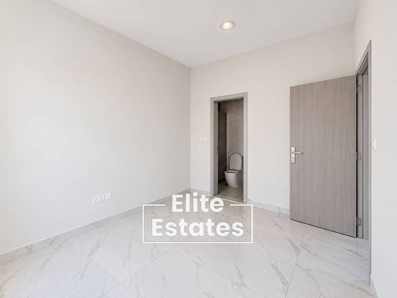 6 Bright Minimal Marble-Tiled Room. png