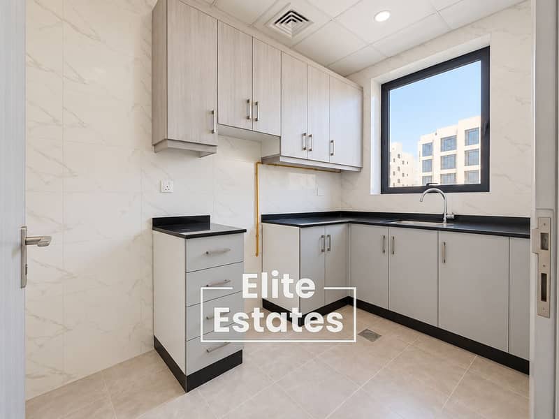 7 Bright Minimalist L-Shaped Kitchen Interior. png