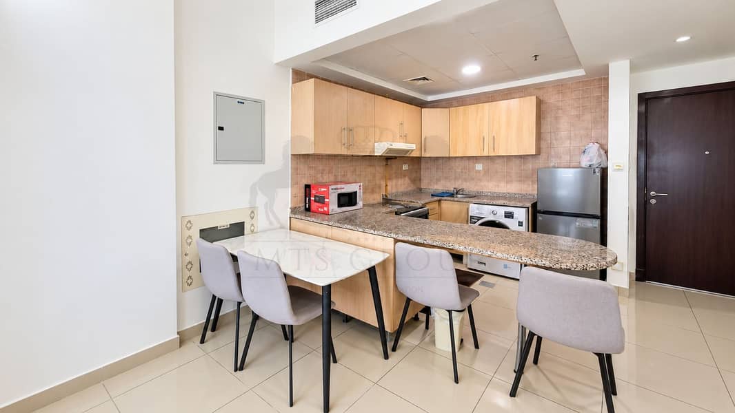 11 Bright Modern Kitchen Dining Area. png