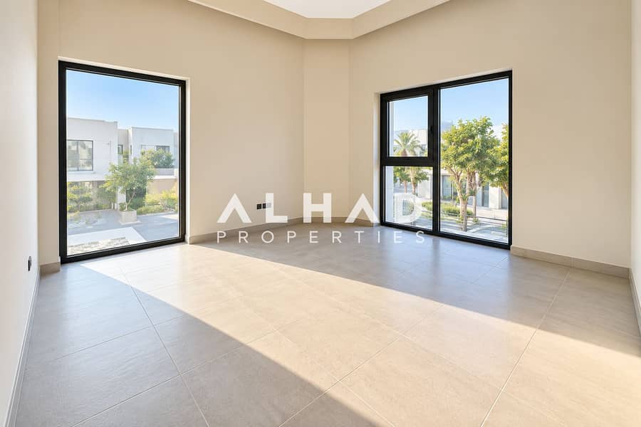 10 Sunlit Minimalist Room with Garden Views. png