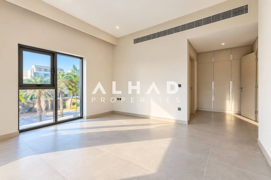 11 Sunlit Minimalist Room with Palm Views. png