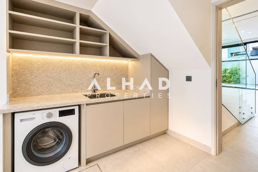 13 Modern Under-Stair Laundry Nook. png
