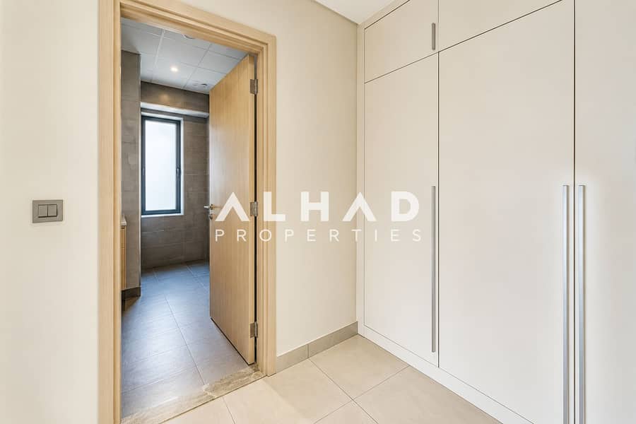 17 Minimalist Hallway with Open Bathroom Door. png