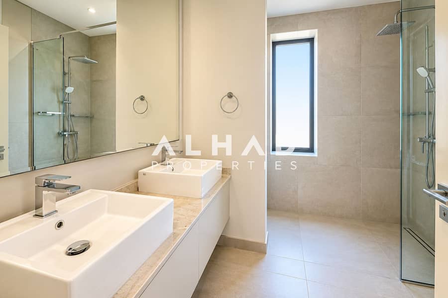 19 Bright Minimalist Bathroom with Twin Sinks. png