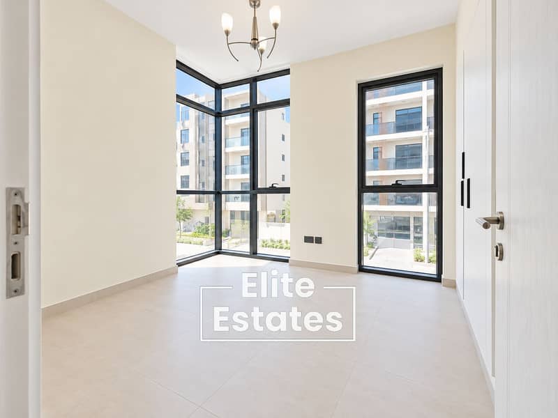 5 Bright Minimalist Room with Corner Windows. png