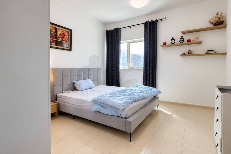 4 Minimalist Bedroom with Blue Accents. png