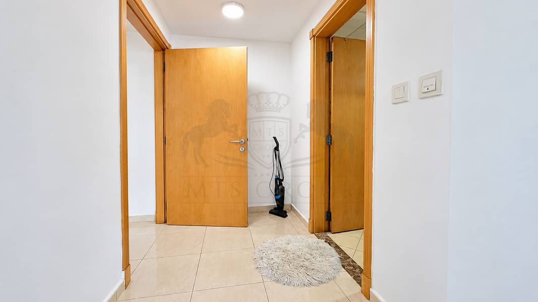 9 Bright Minimalist Hallway with Open Doors. png