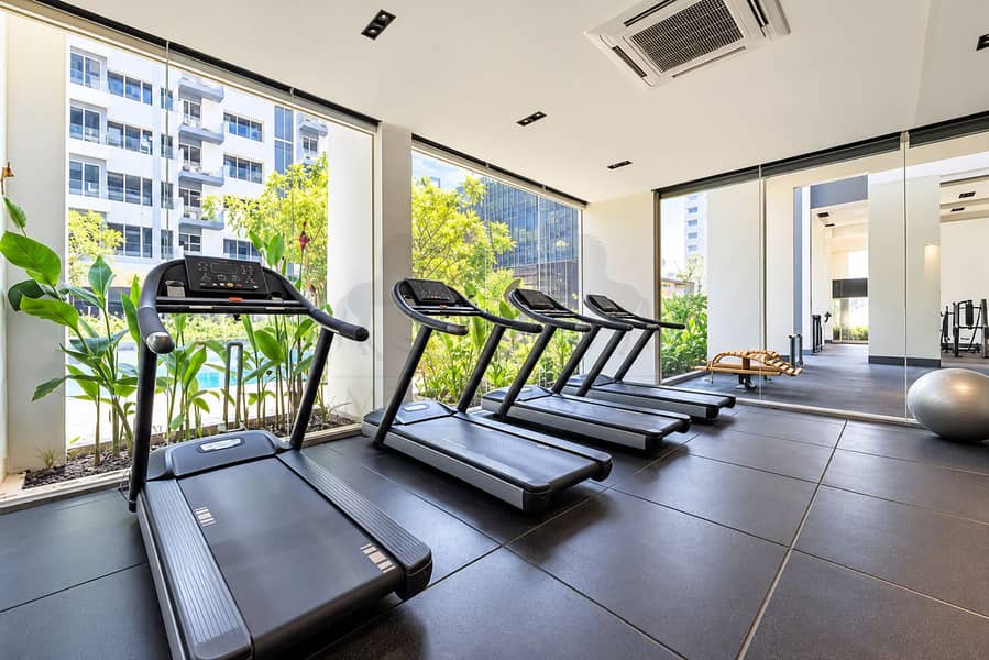 14 Sunlit Modern Gym with Treadmills. png