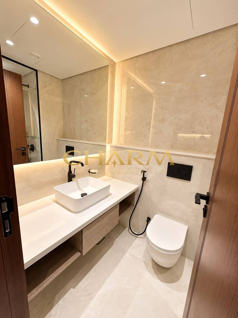 8 Warm Minimalist Marble Bathroom. png