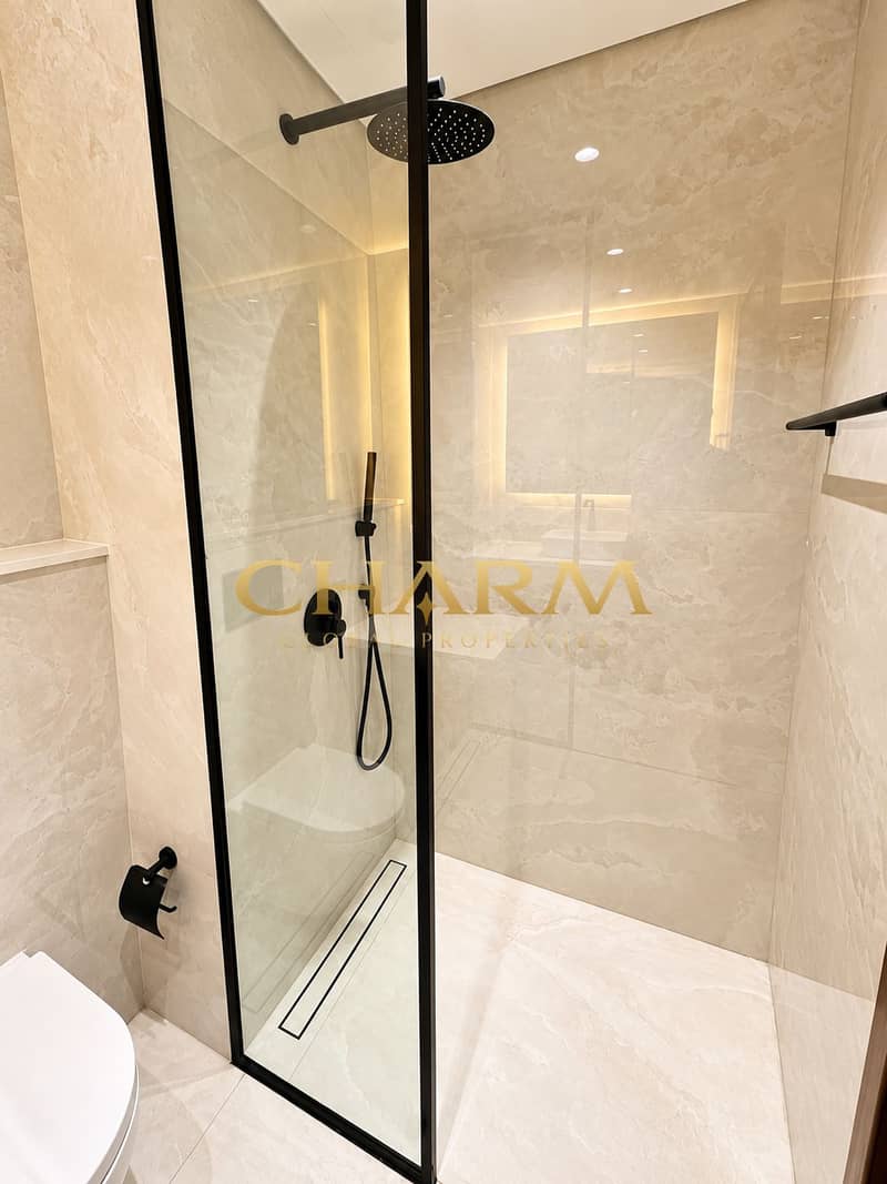 9 Modern Beige Marble Walk-In Shower. png