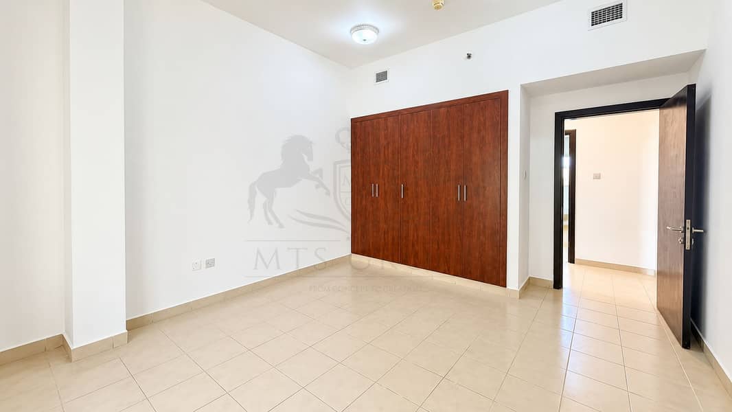 6 Minimalist Bedroom with Mahogany Wardrobe. png