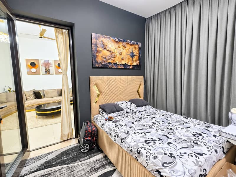 5 Modern Bedroom with Gold Accents and Living Room View. png