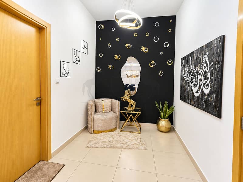 7 Modern Gold-Accented Entryway. png
