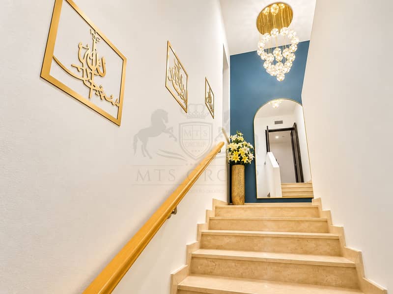 12 Luxurious Marble Stairway with Gold Accents. png
