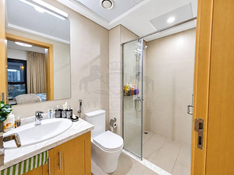 19 Modern Beige-Tiled Bathroom Interior (2). png