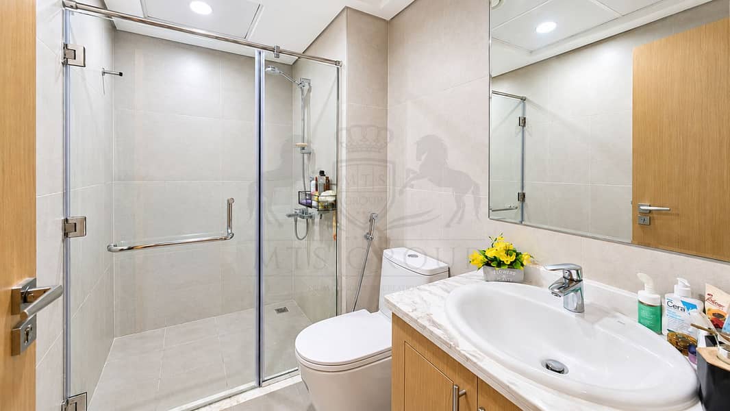 20 Modern Beige Bathroom with Glass Shower (3). png