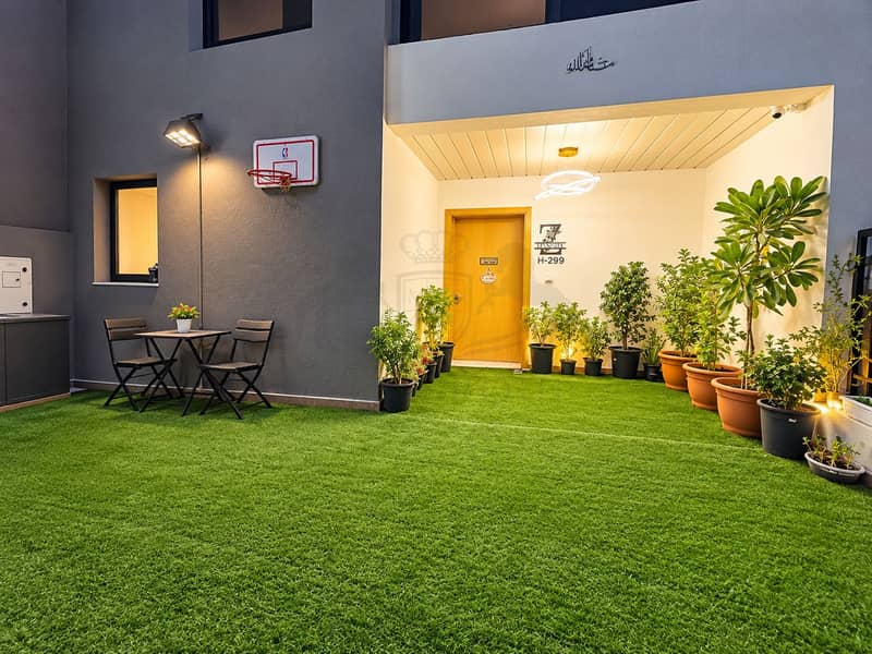 22 Modern Courtyard Entrance at Night. png