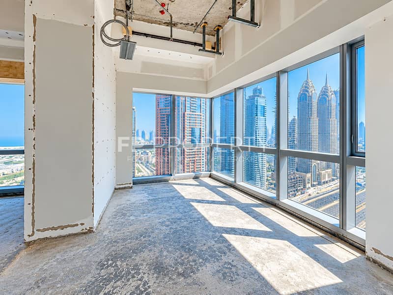 2 Unfinished Corner Room Overlooking City Skyline. png