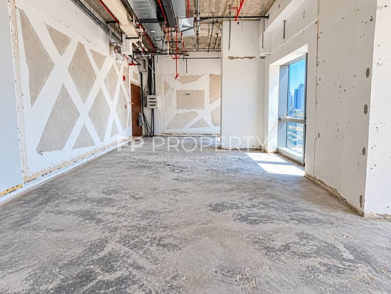 5 Unfinished High-Rise Interior with City View. png