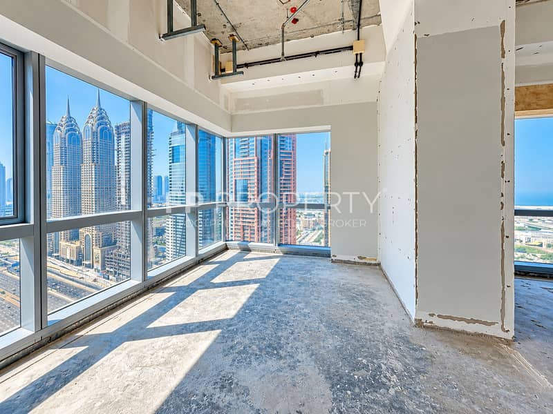 7 Sunlit Unfinished High-Rise with City Views. png