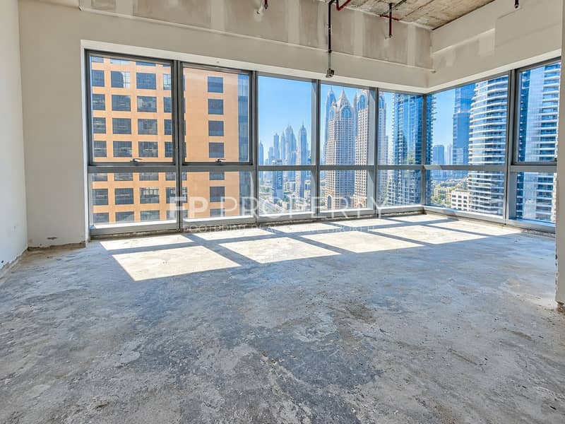 9 Sunlit Unfinished Room with City Views. png