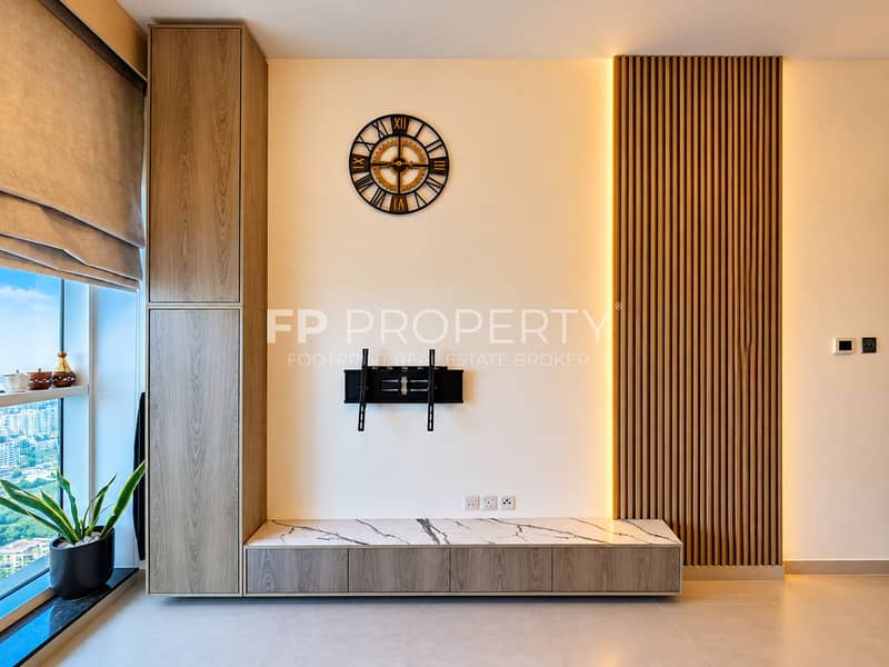 4 Modern TV Wall with Marble Console and Clock. png