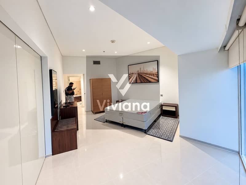 3 Modern Minimalist Bedroom with Cityscape Art. png