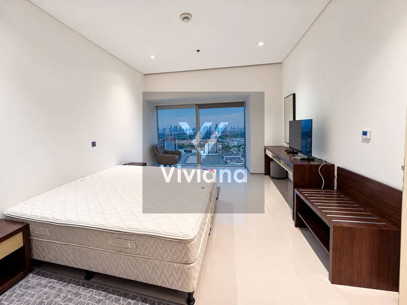 6 Minimalist Bedroom with City Skyline Views. png