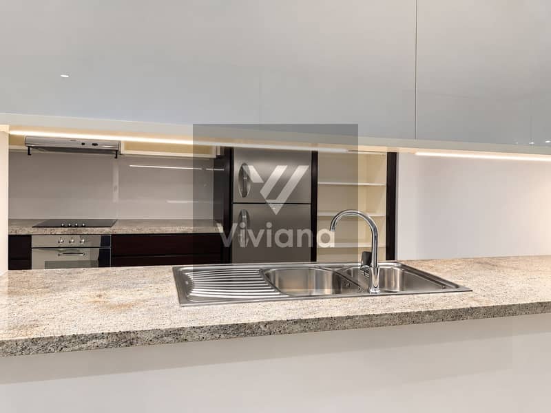 19 Modern Minimalist Kitchen with Island Sink. png