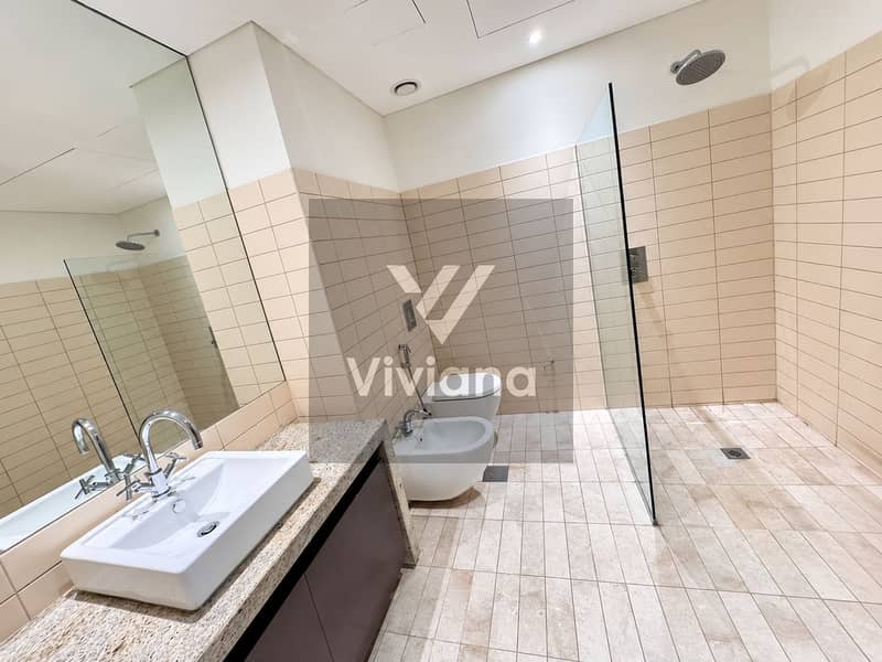 20 Modern Beige Bathroom with Walk-In Shower (1). png
