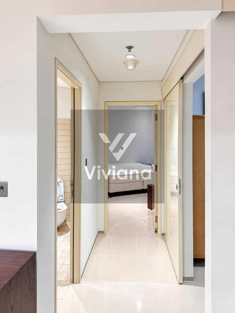 24 Symmetrical Minimalist Apartment Hallway. png