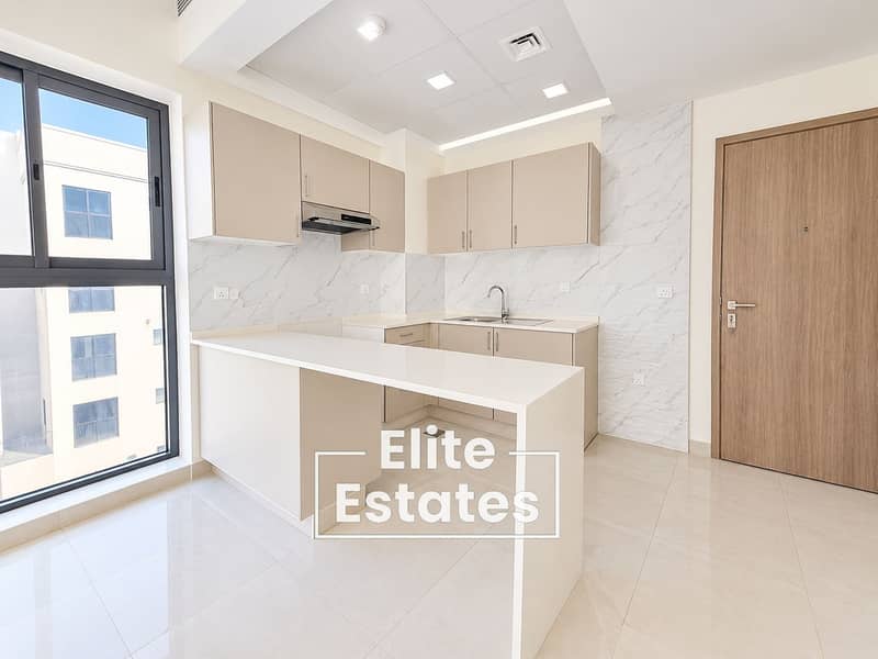 2 Bright Minimalist Kitchen with Marble Accents (1). png
