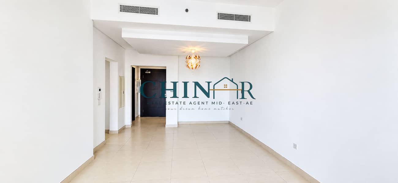 2 Empty Modern Apartment with Statement Chandelier. png