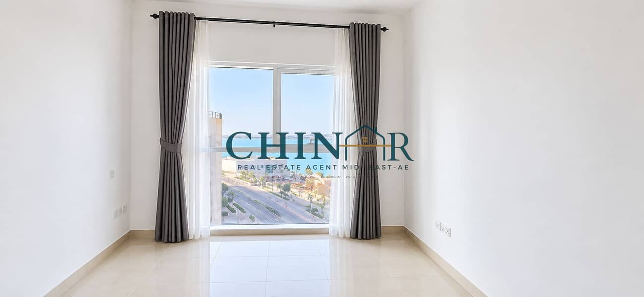 3 Bright Minimal Room with Waterfront View. png