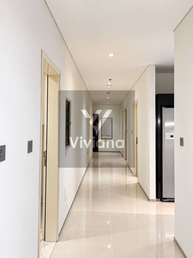 10 Modern Hallway with Reflective Floor. png