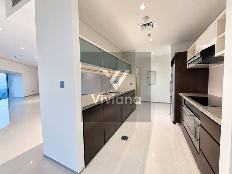 11 Modern Minimalist Kitchen with City Views. png