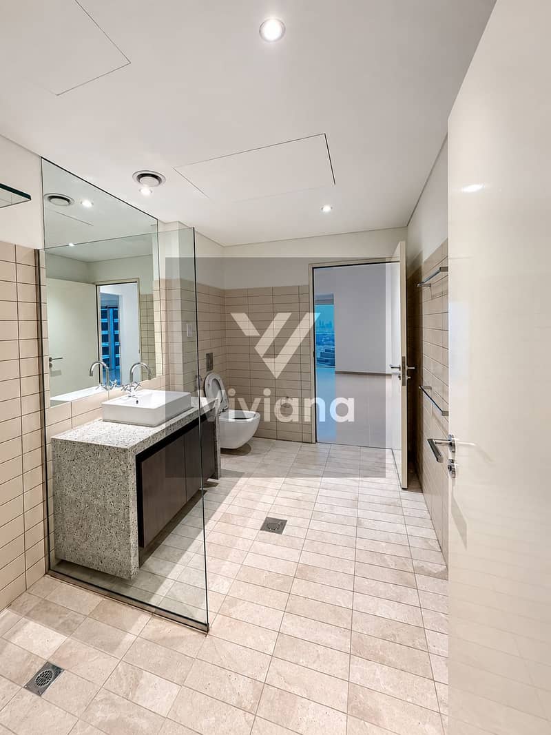 14 Modern Bathroom with Skyline View. png