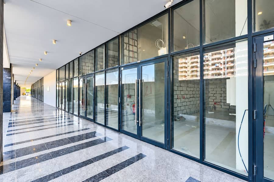 2 Modern Glass Storefront Corridor. png